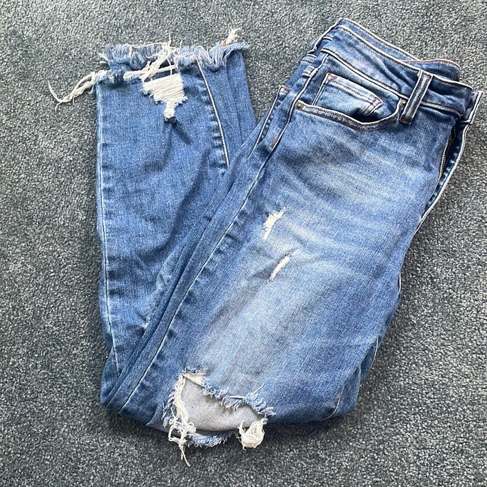 Risen slightly ripped jeans